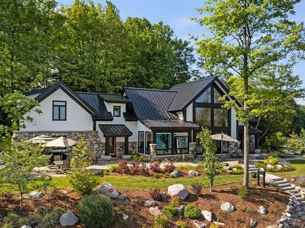 3615 N West Torch Lake Dr, Kewadin, MI 49648