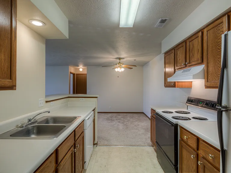 Kitchen sink and counter space at Huntington Apartments.