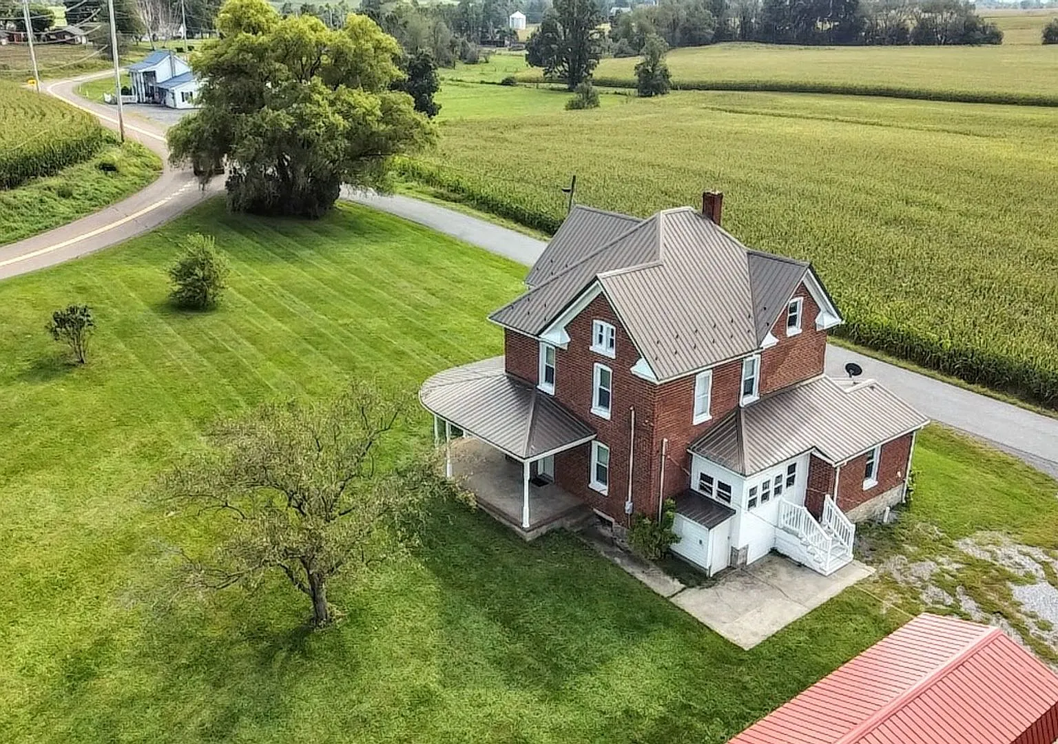 Discover comfort and country charm at 120 Birch Lane, Bedford, PA 15522. — Photo 1