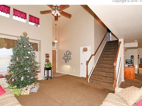 Living Room with Open Layout to Family Room, Dining and Kitchen