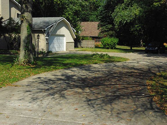 Spacious driveway with two car attached garage