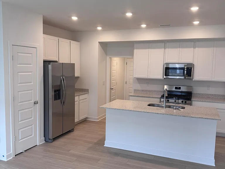 Kitchen + living view
Seamless flow between kitchen and living space