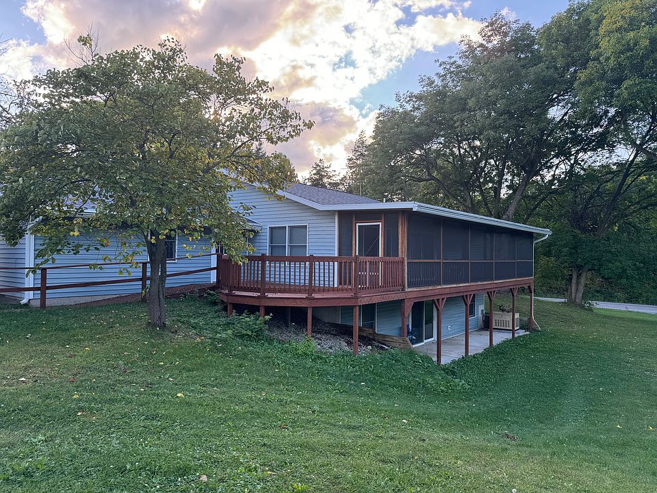 Outside back covered deck and backyard