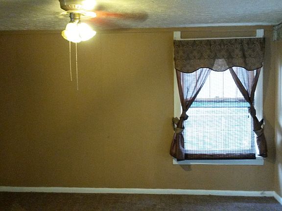 Living room with extra storage closet