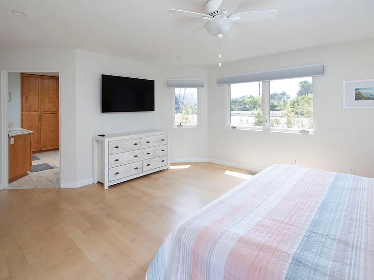 Primary bedroom with king bed and lots of extra space to stretch out
