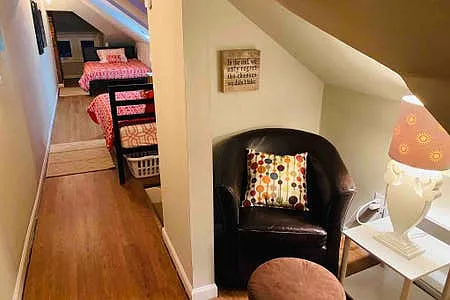 2 Full Beds, skylights & quaint sitting area. Upper level has it's own mini-split unit to control AC/heat
