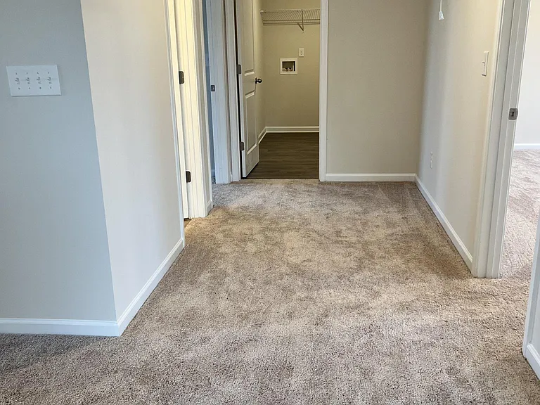 Wide gallery passage area between rooms