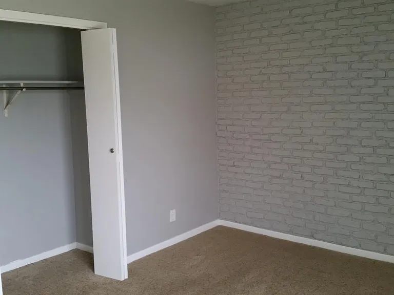 Master bedroom with 1/2 bath en suite.
