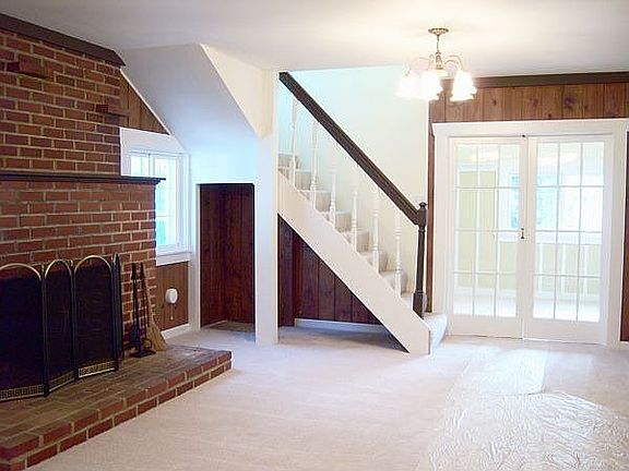 Living room with impressive fireplace