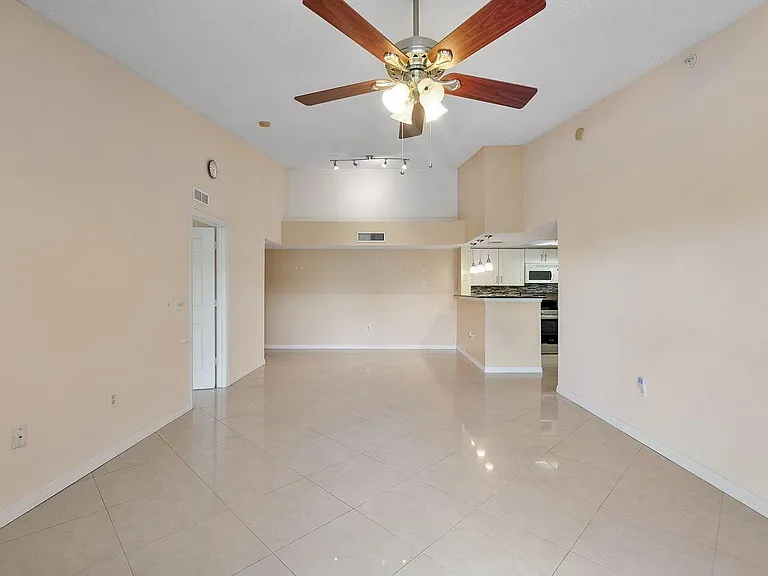 5011 Wiles Rd #303 — Photo 22