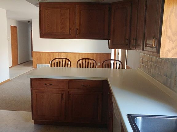 Another view of kitchen and snack bar