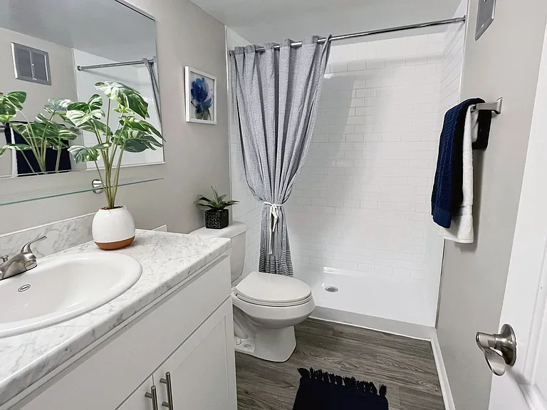 Select bathrooms feature a walk-in shower offering a modern and luxurious allure to your personal space.