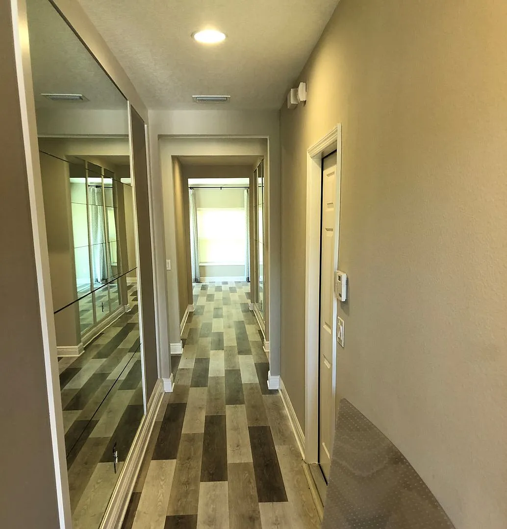 4 Bedroom 2 Bath 3 car garage for rent at 5512 Windsong Oak Dr. Leesburg, FL 34748 — Photo 1