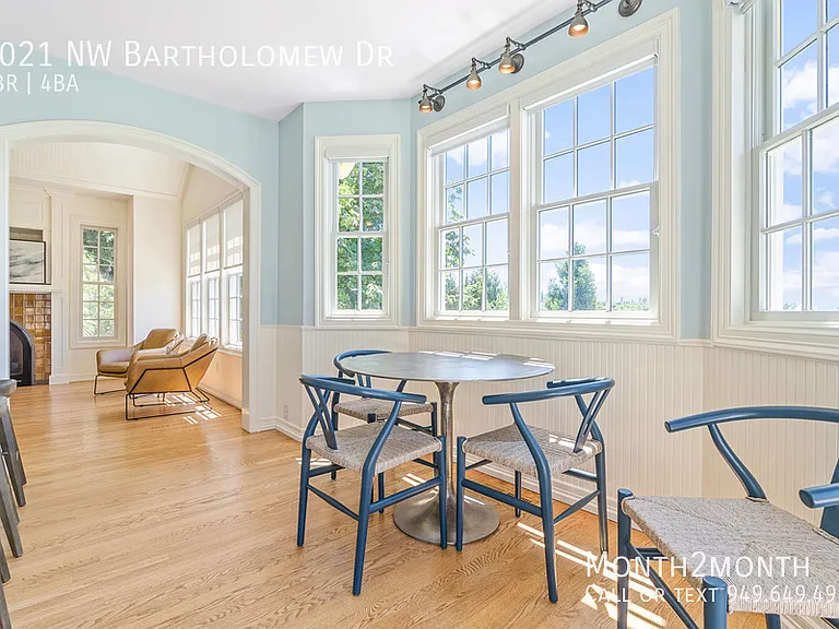 9021 NW Bartholomew Dr — Photo 27