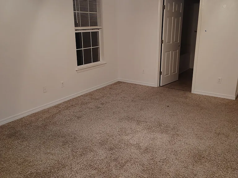 Bedroom #1. Door to Bathroom #1.
