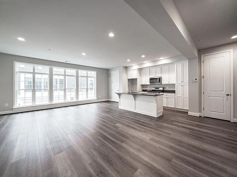 Great Room. Windows will be furnished with faux wood horizontal blinds