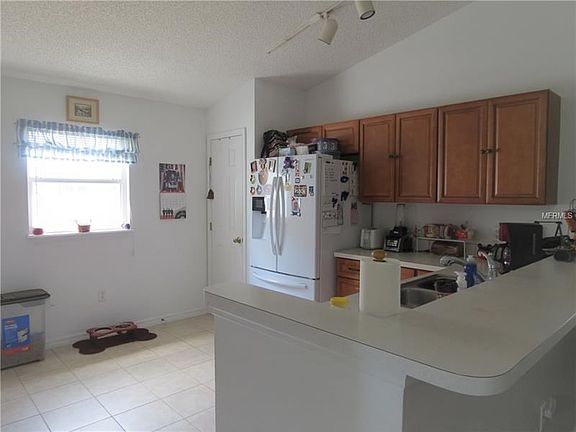 Kitchen with panty closet and eating space