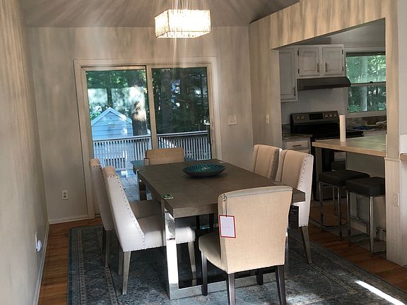dining room with sliding door onto outdoor deck