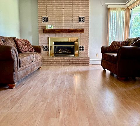 Living room with gas fireplace and couch set included (optional)