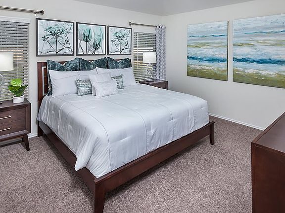 This owner s suite enjoys privacy and convenience featuring a full bathroom, a spacious climate cont