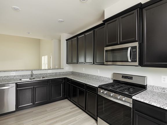 The Newport at NewMarket by LGI Homes