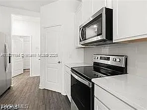 209 SE 26th Terrace Cpe — Photo 19