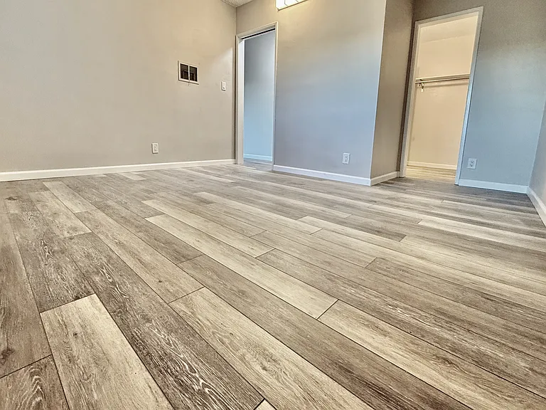 Beautiful brand new luxury flooring in bedroom & throughout unit.