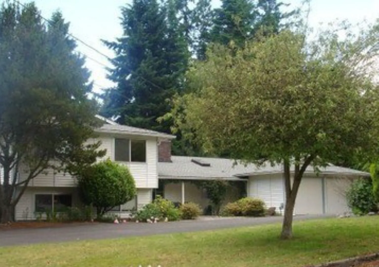 Spacious 4-Bed Tri-Level with 4-Car Garage Walk to Elementary, Middle & High School — Photo 1