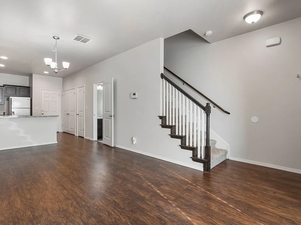 Pin Oak Townhomes - Look and Lease Same Day Special: $500 Off Move-In Costs for July!