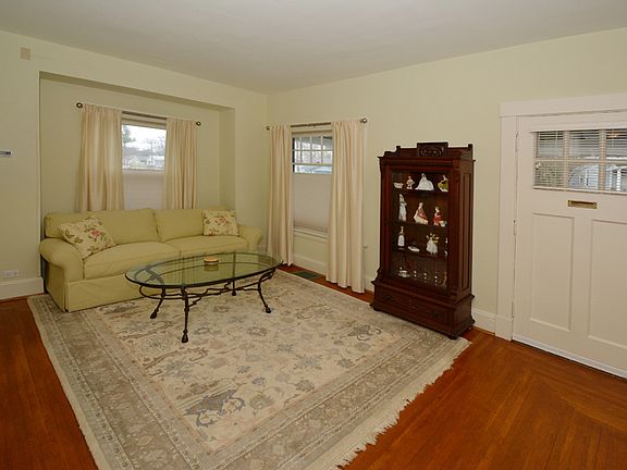Living room w/ front door