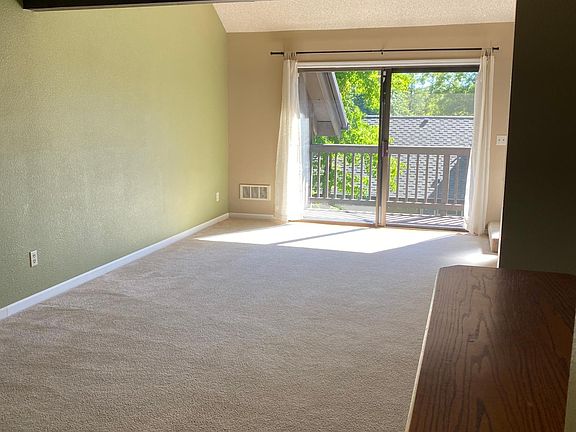Dining area looking into living room.