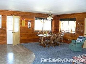 3 doors enter main living area off wrap around deck