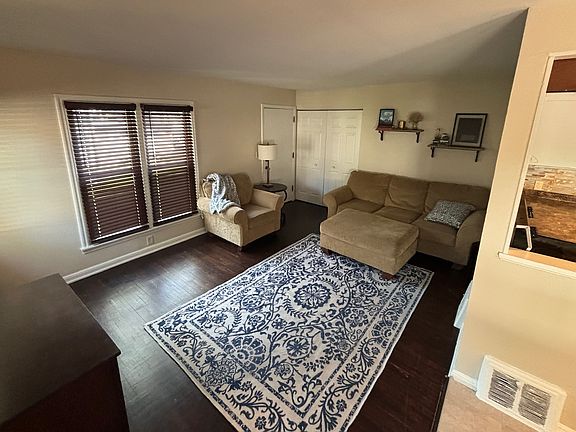 Original wood floors, matching window blinds included.