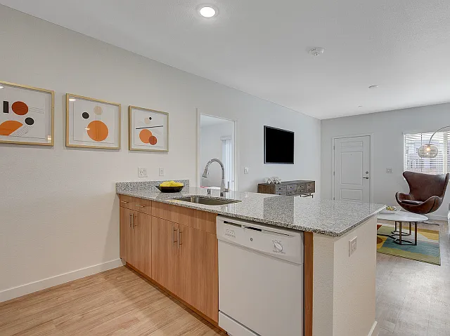 Breakfast bar with tons of counter space in 2 bedroom model home
