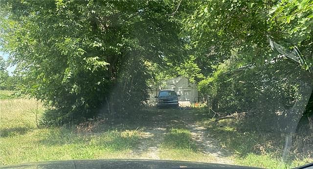 1st image of 6300 NW Cookingham Rd