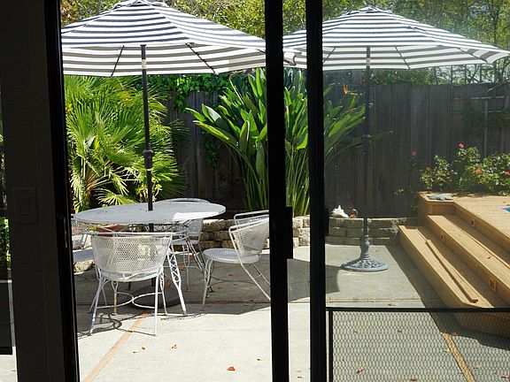 Private backyard with pool. patio space and room to relax or entertain
