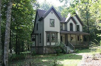 Main home front
						:
						Large front porch, Bay window on the parlor and kitchen area.