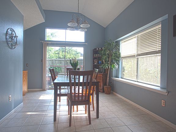 Dining space overlooks deck