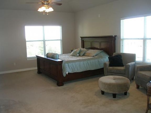 Huge master has room for sitting aree or exercise equipment.Has views!