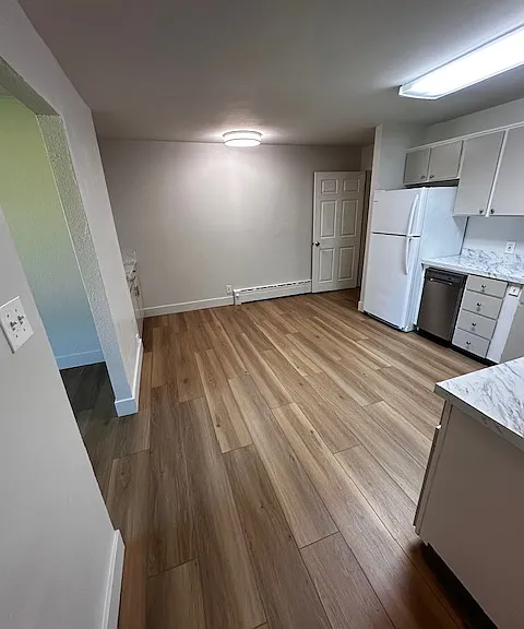 End of kitchen and entry into laundry.
