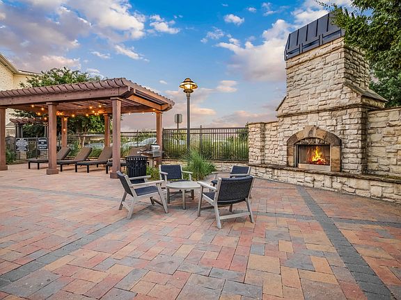Poolside Fireplace with Cozy Seating