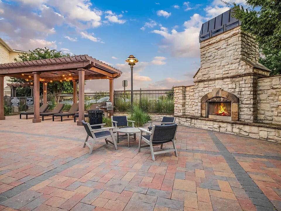 Poolside Fireplace with Cozy Seating