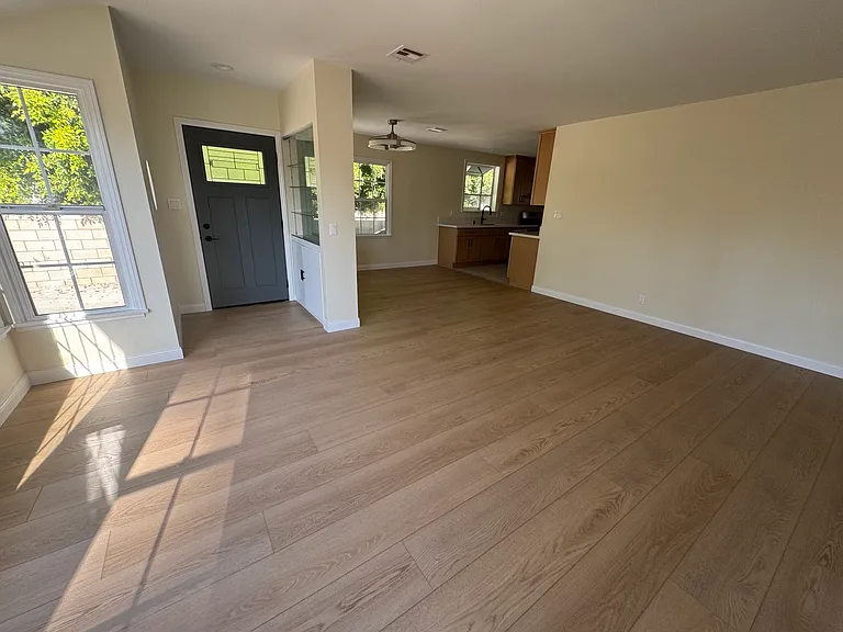 Living room, dining area, and kitchen