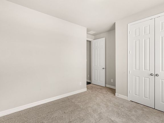 An additional view the the secondary bedroom and closet.