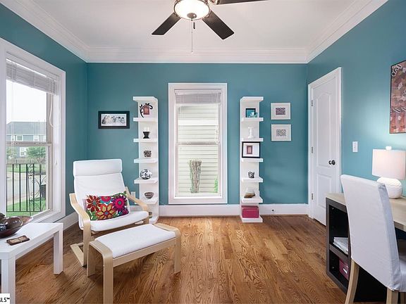 This room can be used as an office or a formal living room.