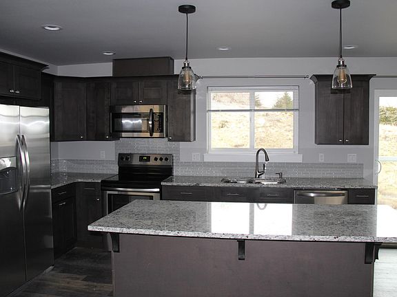 Kitchen. Stainless steel appliances and granite counter tops