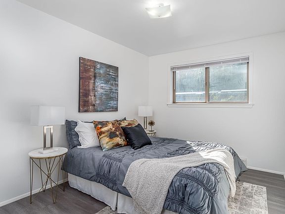 Spacious bedroom showing with Queen size bed