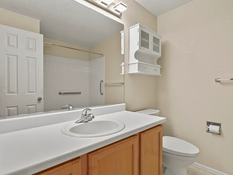 Hall bathroom with tub and shower