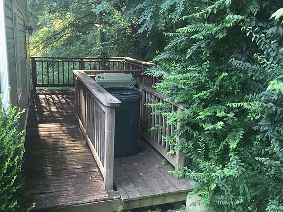 Private side deck off the kitchen entrance.  