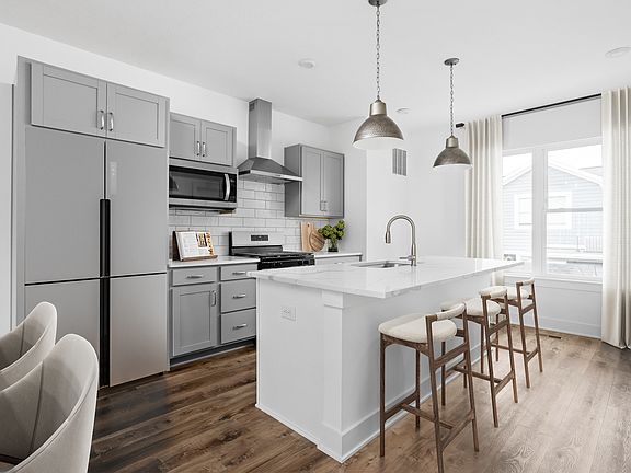 Kitchen w designer finishes and open floor plan